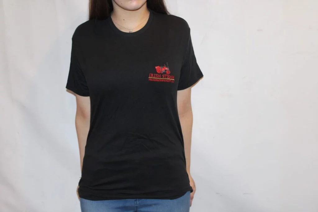 Black t-shirt featuring the "Irish Steam Preservation Society" logo in red, worn by a woman.